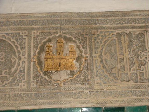 An apparently iconoclastic painting with the scewed up koran verses above and below